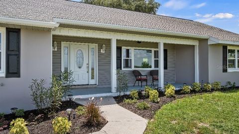 Photo of 37153 County Road 452, Grand Island, FL 32735 (MLS # TB8418973)