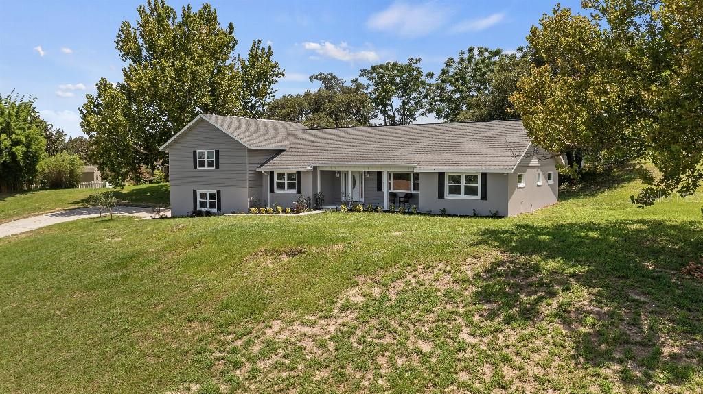 Photo of 37153 County Road 452, Grand Island, FL 32735 (MLS # TB8418973)