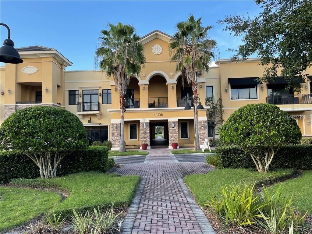 Photo of 13538 Village Park Drive #J, Orlando, FL 32837 (MLS # S5142291)