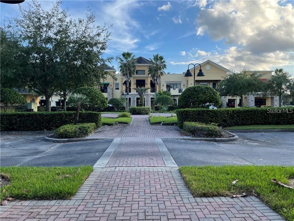 Photo of 13538 Village Park Drive #J, Orlando, FL 32837 (MLS # S5142291)