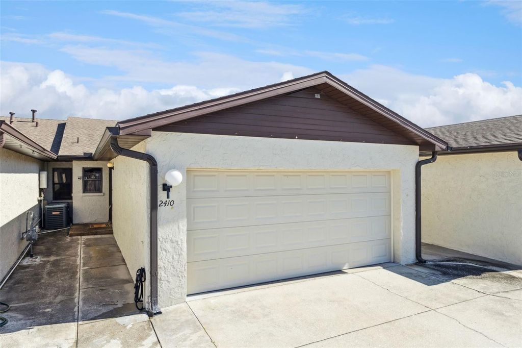Photo of 2410 Hartridge Point Drive W, Winter Haven, FL 33881 (MLS # O6378495)