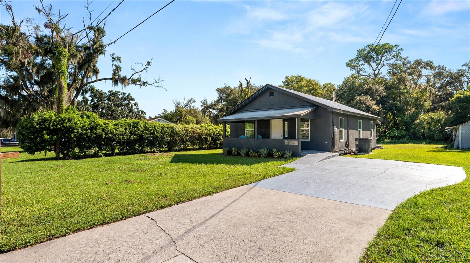 Want historic charm without the hassle? This fully updated 3 bedroom, 2 bath bungalow delivers all the character you love with modern upgrades already done for you. SELLER MOTIVATED! Enjoy 1,272 sqft of stylish living space that blends charm and convenience. Updates include all new windows, a 2024 3-ton A/C system, and a brand-new water heater. Inside, the open floor plan features sleek luxury vinyl flooring, a renovated kitchen with wood cabinetry, quartz countertops, stainless steel appliances, and modern lighting. Both bathrooms showcase bold tile designs and updated vanities. Step outside to a fresh stucco exterior and a 6,000 sqft lot — perfect for outdoor living, gardening, entertaining, or just relaxing. Prime Plant City Location!! ONLY 5 minutes from Historic Downtown Plant City’s dining, markets, and entertainment, plus easy I-4 access for quick commutes to Tampa or Lakeland. Whether you’re looking for a move-in ready home or a property with investment potential, this one checks every box. Schedule your showing today — this Plant City gem won’t last!
