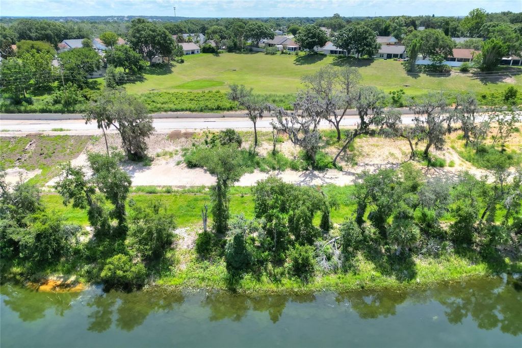 Photo of 173 Tranquil Mirror Lake Court #Lot 6, Clermont, FL 34711 (MLS # O6391207)