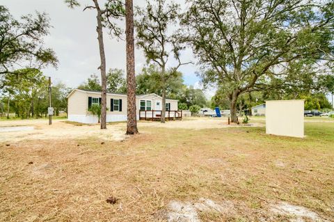 Photo of 14247 Hurricane Drive, Weeki Wachee, FL 34614 (MLS # O6352270)