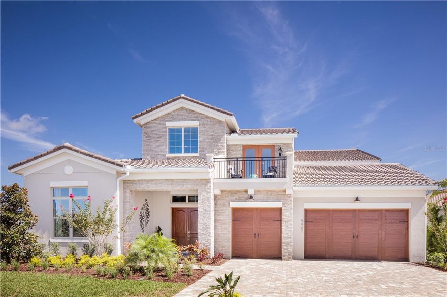 Previously a model home never lived in, this  home has all the upgrades!  Set on an oversized lot with water and golf views this Ponte Vedra floor plan by Jones homes has everything you are looking for.  The ultimate home to entertain your friends and family with over 5600 sq ft including 5 bedrooms and 5 bathrooms with an oasis for a backyard.  As you walk into the vaulted entryway you see your very own built in wine cellar.  This home was designed with so many custom features including a full wet bar upstairs, sauna, gym, outdoor kitchen.  Make your appointment today to see this amazing property.