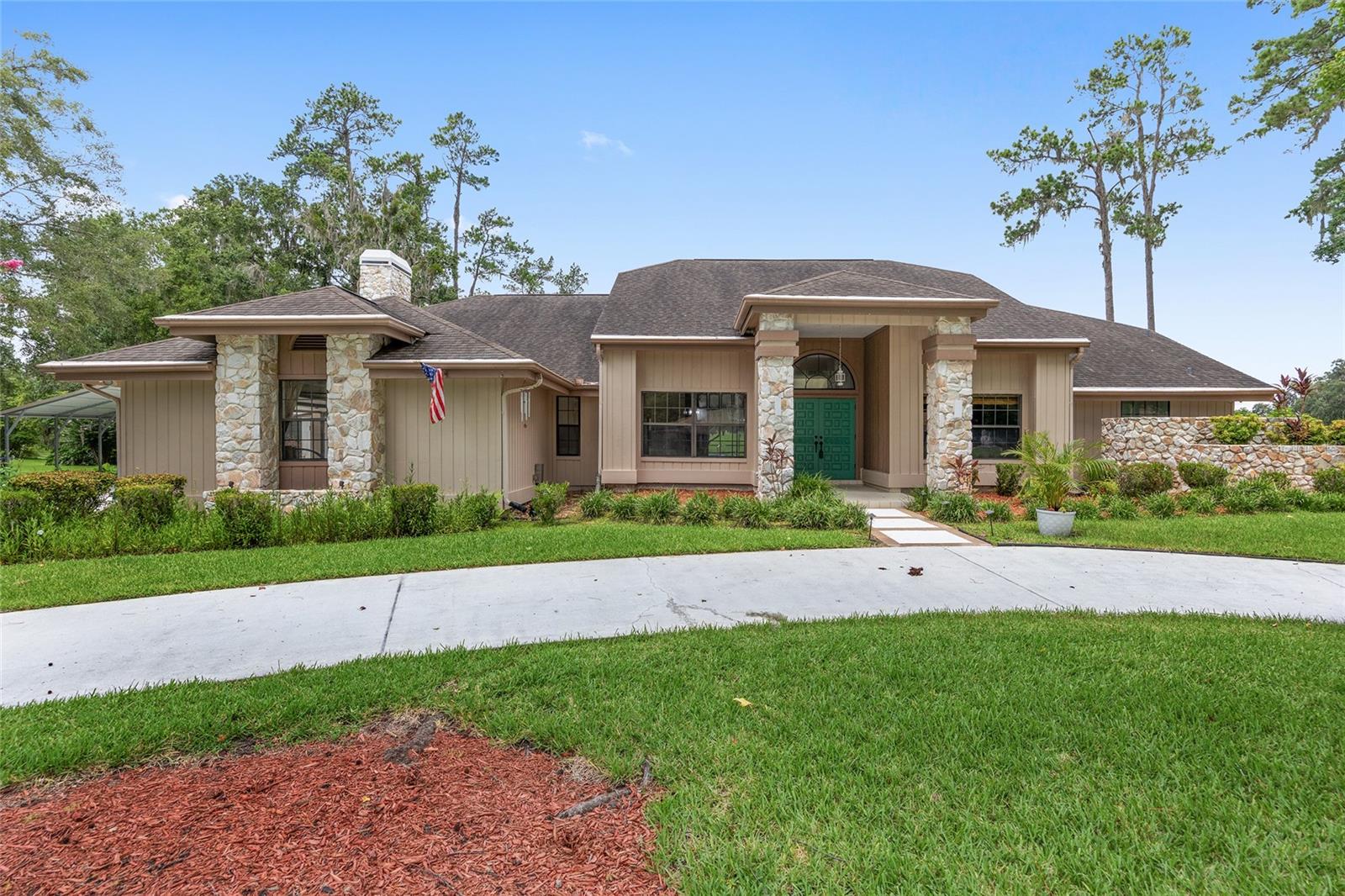 Spacious 4,000+ SqFt Contemporary Pool Home on over an acre of property across from The World Equestrian Center!
Neighborhood borders Golden Hills Golf & Country Club—with No HOA. This beautiful custom home has 4 bedrooms, 3.5 baths, a dedicated office and multiple living areas. The oversized screened pool, spa and summer kitchen are perfect for relaxing and entertaining. Enjoy an open layout with architectural details, a wood burning fireplace, split floor plan and a luxurious primary suite with dual walk-in closets and pool access. The primary bath has walk-in shower and a soaking garden tub. Features include extra-large custom windows for an abundance of natural light throughout the home. Stainless steel appliances and a gas cook top the chef will love. The home has been well maintained and is a true gem, just waiting for a new buyer to update the home to fit their personal style. There are 3 newer a/c units and 2 water heaters. This is a rare chance to own a custom-built home in one of Ocala’s most desirable communities—with easy access to WEC, dining, and major routes.