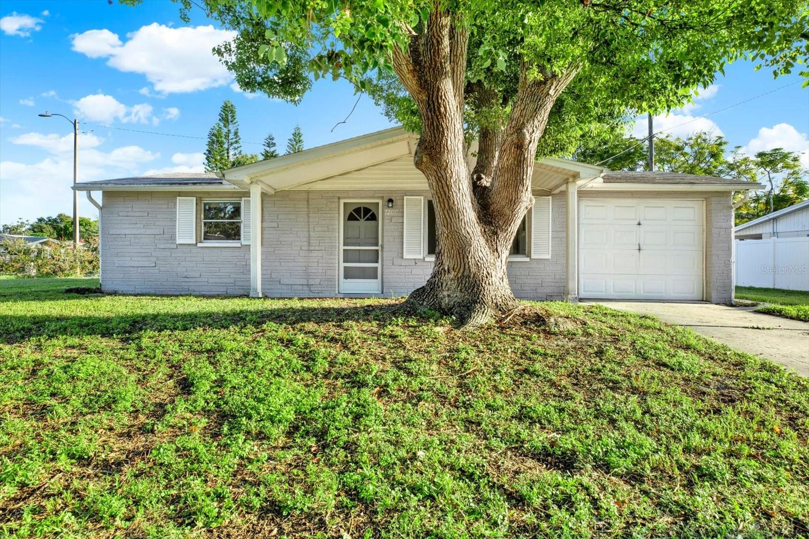 Welcome to this inviting 2-bedroom, 1-bath home in the established Palm Terrace Estates community of Port Richey. This residence combines comfort and convenience with laminate flooring, central air, and an efficient layout. The property includes a one-car garage and sits on a quiet street with sidewalks, mature landscaping, and easy access to local schools, shopping, dining, and medical facilities. With no HOA, you’ll enjoy flexibility and freedom of ownership. Just minutes from the Gulf, beaches, parks, and major roadways, it’s an excellent choice for first-time buyers, downsizers, or investors seeking a solid opportunity in Pasco County.