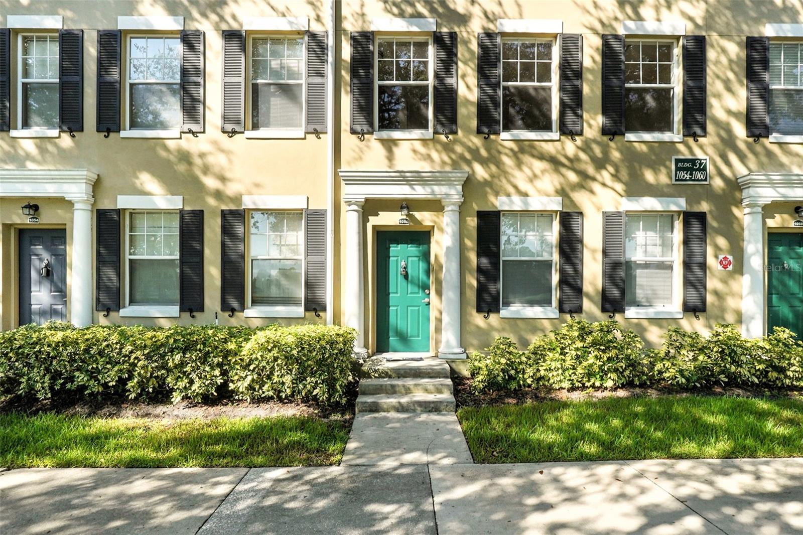 Welcome to 1056 Waterside Dr - a beautifully upgraded 3-bedroom, 2-bath townhome in the highly sought-after Celebration. This move-in-ready home features beautiful water and golf course views and is priced to sell—offering one of the best values in Celebration! Updates just completed include: New Roof, New A/C, New Water Heater, New Appliances, and Fresh paint throughout, with all new LED lighting fixtures and door hardware over three floors. Step inside the front entry to discover a versatile and closed-in ground-floor bonus room—perfect for a home office, gym, or guest space with French doors, built-in shelving, and a media wall ready to connect your favorite flat-screen TV. Adjacent next door is an oversized 2-car garage freshly painted, new LED light, a recent new Water Heater, new turn-off valve and plumbing, and a Laundry area with washer and dryer. The second level features an expansive open-concept living and dining area with a featured Brick Slip TV Wall, Architectural ceiling in the living room, recessed lighting, a built-in dining area nook with padded backrest and bench seats opposite the kitchen, new LED lighting fixtures, laminate flooring, and abundant natural light with views to the Golf Course and Pond. The updated kitchen features granite countertops, a heightened breakfast bar with storage underneath, LED Strip Ceiling Light, Travertine floor tiles, a brand new Frigidaire Fridge Freezer with French Doors, and matching stainless steel Dishwasher, and recent new Range. The newly installed and permitted Trane A/C system with WiFi Thermostat comes with a warranty from WesternAir. Upstairs, the third level offers the Primary Owner’s Bedroom with Walk-In Closet, updated En-Suite Bathroom, cabinets, twin sinks, wall lights, and travertine wall and floor tiles. Additional bedrooms two and three share a family bath on the third floor. All three bedrooms Include Newly installed Ceiling fans with remotes and dimmable lighting and new door hardware. Enjoy Siena’s private amenities and Maintenance Free Lifestyle, including a clubhouse, fitness center, playground, and pool. As a Celebration resident, you'll also gain access to six additional community pools, tennis and basketball courts, sports fields, and over 25 miles of scenic walking and biking trails. Ideally located just minutes from downtown Celebration, Celebration Pointe, Publix, AdventHealth, and world-class attractions like Walt Disney World, this home offers unbeatable access to shopping, dining, and entertainment—plus Orlando International Airport is only 25 minutes away using Toll Rd 417. Whether you're looking for a serene 'Lock and Go' retreat, a stylish full-time residence, or a smart investment opportunity, this is your chance to own a slice of the iconic Celebration lifestyle. All Exterior maintenance, pest control, trash collection, roof replacement, and landscaping come included with Siena dues. Schedule your private showing today!