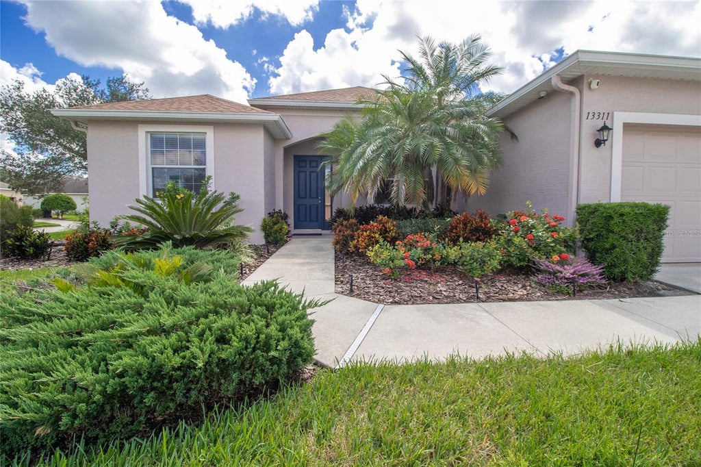 Photo of 13311 50th Lane E, Parrish, FL 34219 (MLS # A4709957)