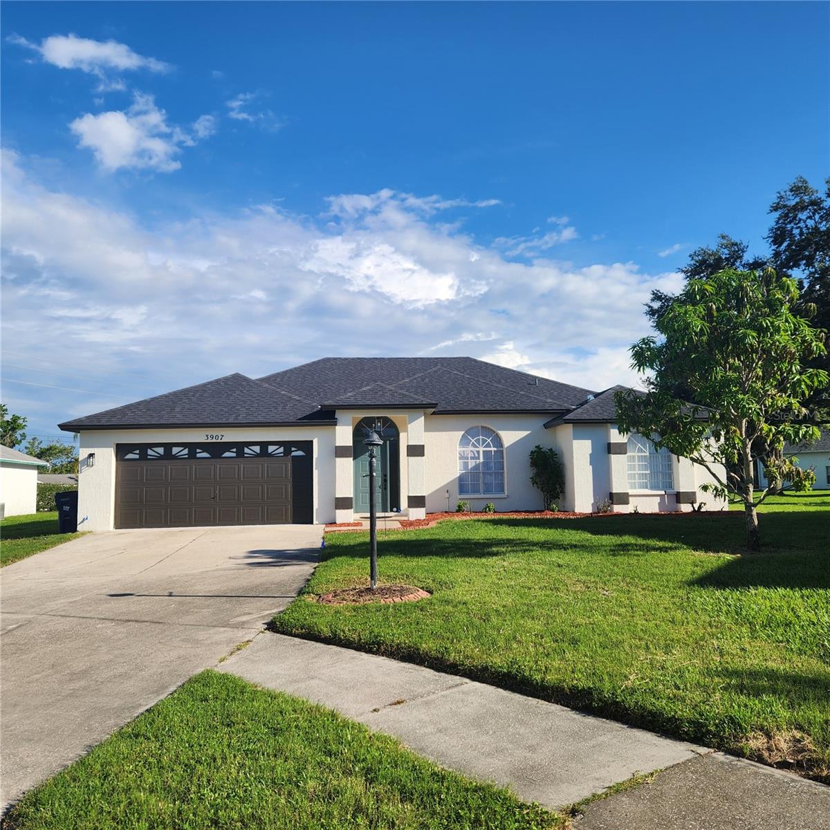 New to the rental market, this beautifully renovated 4-bedroom, 2-bath home features a private pool overlooking a pond in the popular Hamlets Grove neighborhood. The all-new kitchen boasts stainless steel appliances, quartz countertops, brand-new two-tone cabinetry, and pendant lighting over the large breakfast bar that opens to the family room. The primary suite's ensuite bathroom includes his and her vanities and two walk-in closets, with a lovely soaking tub centered between a private lavatory and a glass-enclosed shower. The second bath offers twin sinks and a large quartz countertop vanity with plenty of storage, a step-in glassed shower, and a door leading to the pool deck. The entire home has been freshly painted, both inside and out, featuring tile floors and high ceilings in the main living areas, and vinyl laminate in the bedrooms. The in-ground pool is covered by a screen enclosure with a covered lanai, perfect for taking in the sunset over the pond out back. Located off University Parkway and north Tuttle, this neighborhood is surrounded by countless dining and shopping opportunities, and close to popular UTC Mall, Benderson Park, the Sarasota/Bradenton airport, and is just a short drive to Lido Beach.