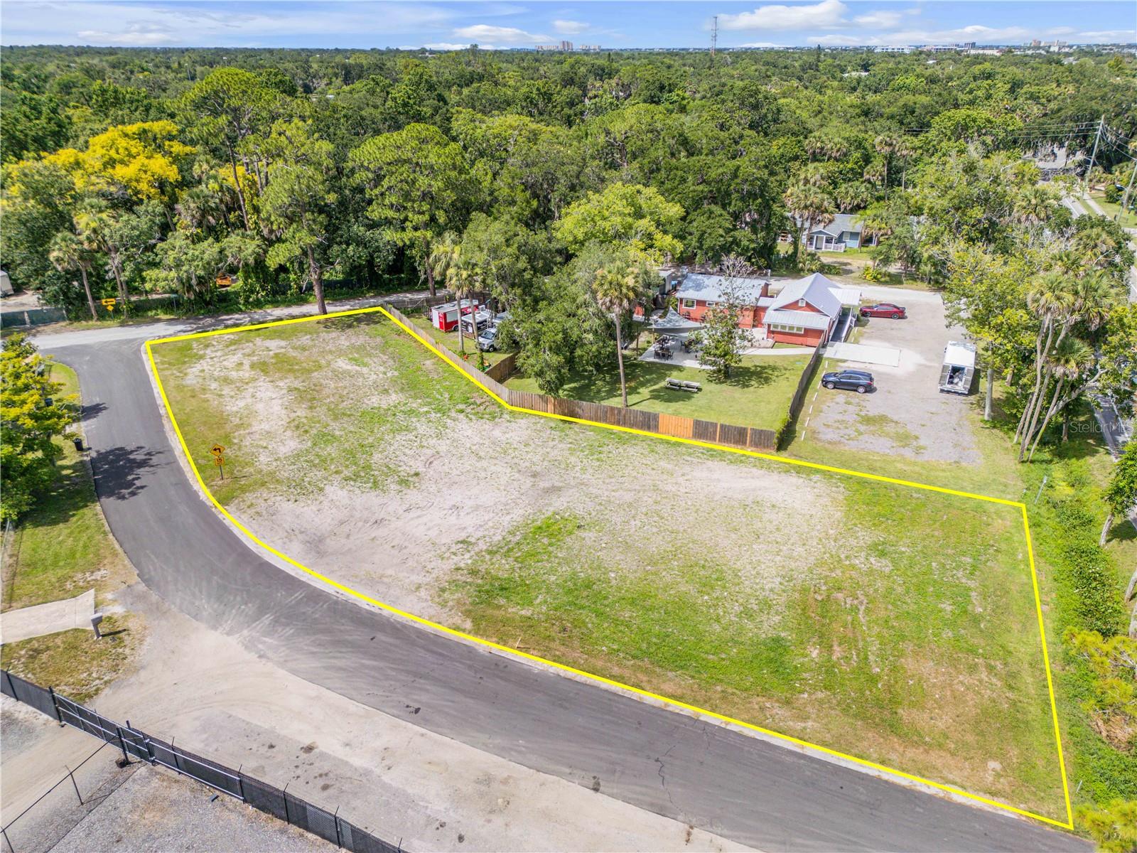 Build-Ready Redevelopment Lot. Situated within the City’s valued Canal Street Community Redevelopment Area, this fully cleared .43-acre corner lot offers a rare opportunity for bold new development. Zoned MU/10B3, this site is primed for accelerated turnaround with no existing demolition required. Just steps from the charming Canal Street Historic District, this site is immersed in monthly Art Strolls, Sip & Stroll, classic car events, and community markets amid pedestrian-friendly, tree-lined avenues. A stone’s throw from the beach and Intracoastal, ~25 minutes to Daytona Beach, and ~1 hour to Orlando International Airport, it offers appeal to both coastal tourists and working professionals.
Developers, entrepreneurs, and investors—envision a boutique café with upstairs rentals, a cluster of short-term luxury units, or a professional plaza serving local needs. This location blends vibrant foot traffic, growth incentives, and transportation convenience, delivering exceptional ROI potential.
Fully cleared and ready for design, construction, and immediate occupancy. Utilities are in place. Create your vision in NSB’s thriving redevelopment corridor.
