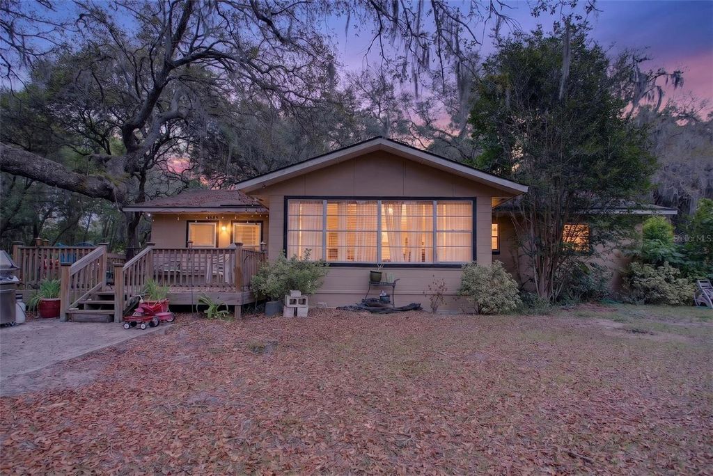 Photo of 6685 Woodland Drive, Keystone Heights, FL 32656 (MLS # C7525749)