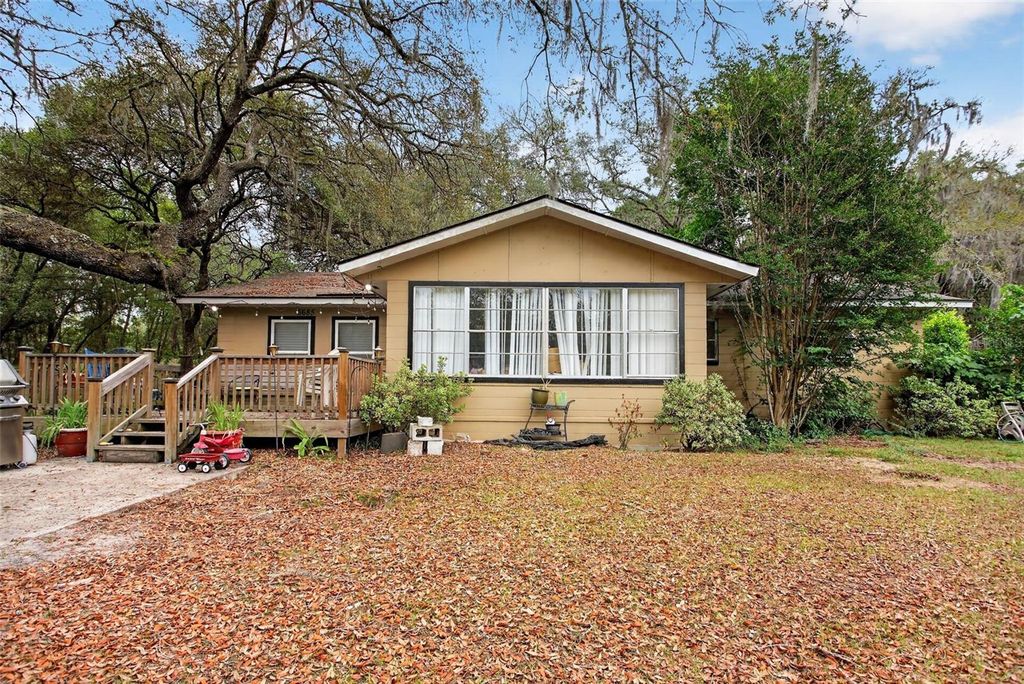 Photo of 6685 Woodland Drive, Keystone Heights, FL 32656 (MLS # C7525749)
