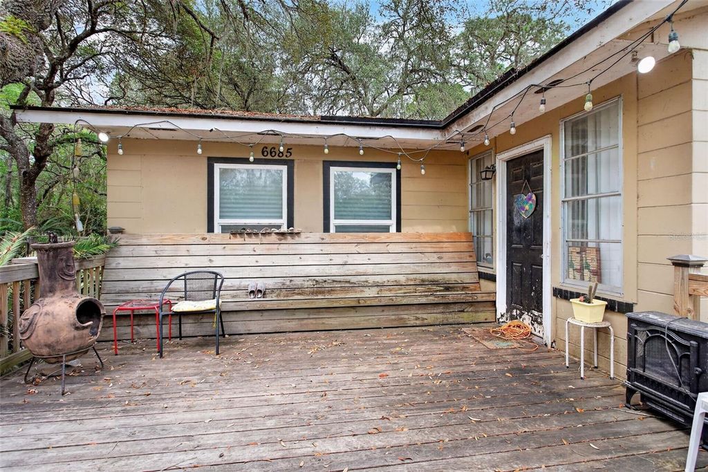 Photo of 6685 Woodland Drive, Keystone Heights, FL 32656 (MLS # C7525749)