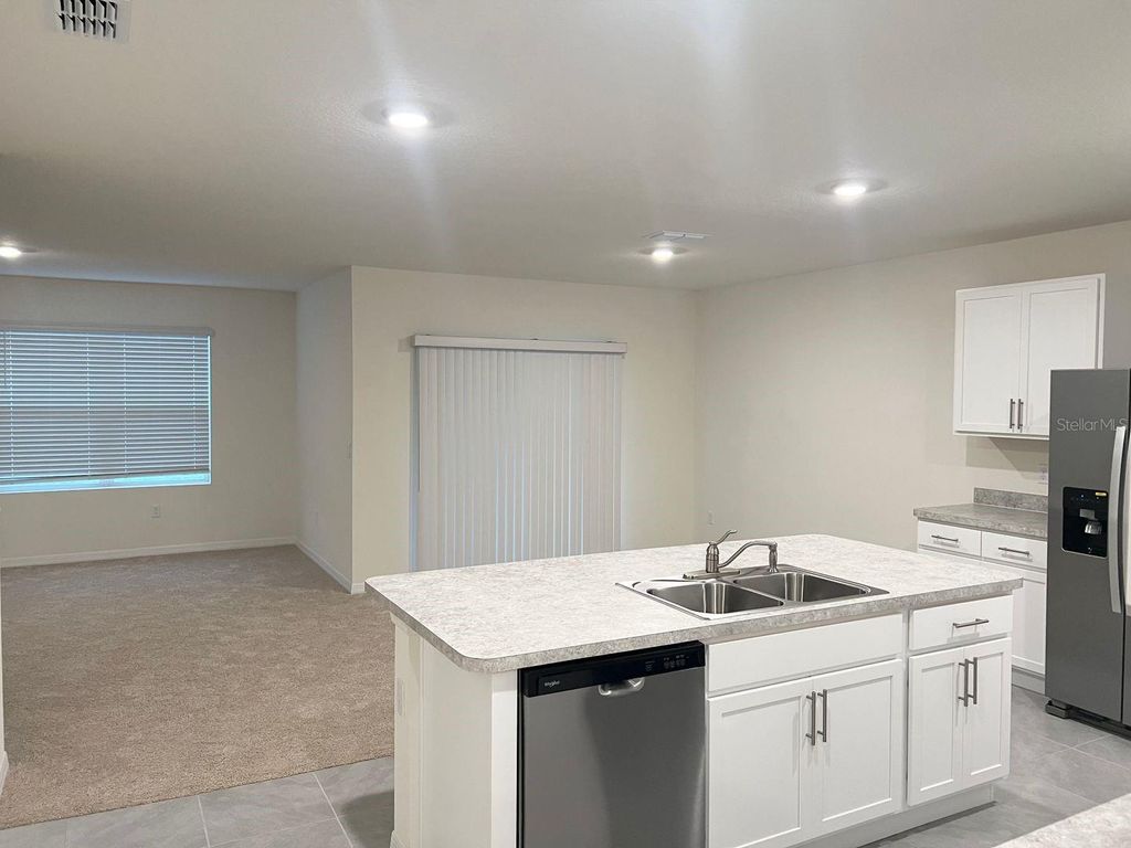 Photo of 709 Versailles Lane, Kissimmee, FL 34759 (MLS # O6409671)