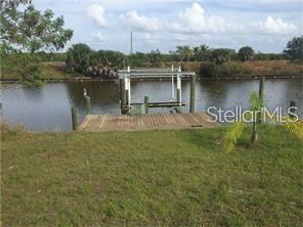 Photo of 8182 Clyde Circle, Port Charlotte, FL 33981 (MLS # D6143462)