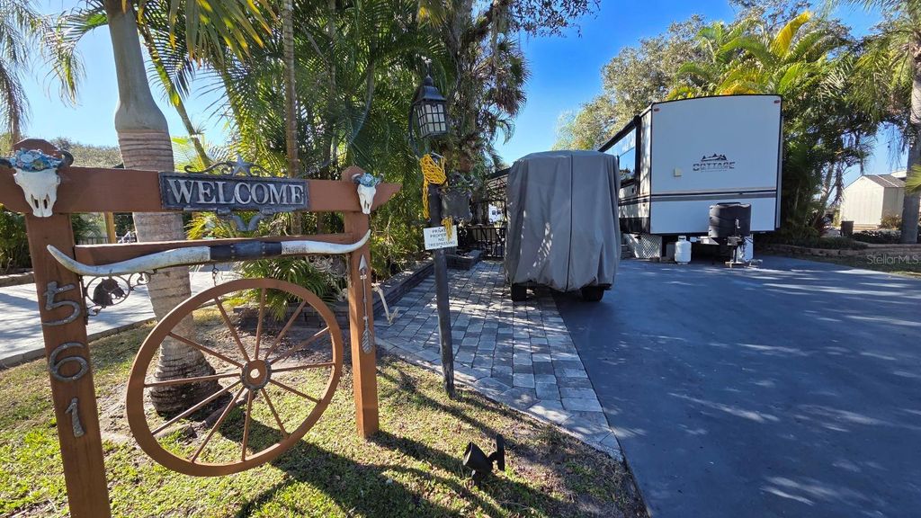 Photo of 561 Waterway Drive, River Ranch, FL 33867 (MLS # TB8470268)