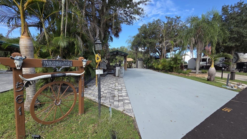 Photo of 561 Waterway Drive, River Ranch, FL 33867 (MLS # TB8470268)