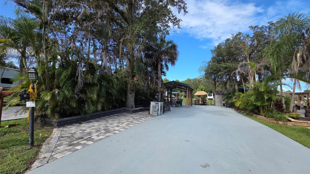 Photo of 561 Waterway Drive, River Ranch, FL 33867 (MLS # TB8470268)