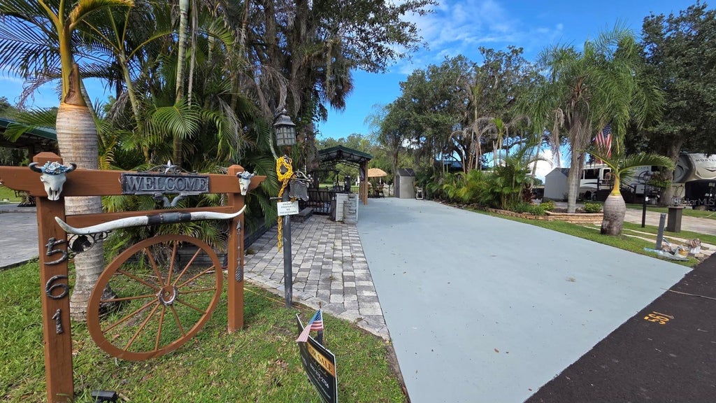 Photo of 561 Waterway Drive, River Ranch, FL 33867 (MLS # TB8470268)