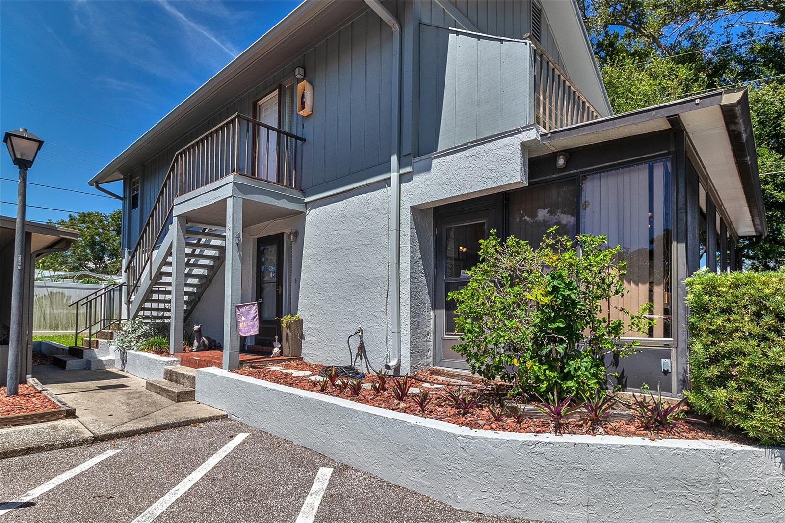 Welcome to this delightful 2-bedroom, 2-bathroom GROUND FLOOR condo in the heart of Clearwater, FL. This condominium places you mere minutes from the charming town of Dunedin—famed for its waterfront vistas, access to Honeymoon Island and Caladesi Island parks. It is also just a short drive to Palm Harbor, which is also a highly desirable town to live near!
Enjoy peace of mind with numerous upgrades including A BRAND NEW A/C UNIT, newer windows, a BRAND NEW electrical panel, and a new washer and dryer that conveys with the home!! The exterior of all the buildings have NEW PAINT and a NEW ROOF too! ALL OF THE ASSESMENT FEES FOR THESE UPGRADES HAVE ALREADY BEEN PAID IN FULL.
Step inside to a floor plan that opens into a large Florida room—a versatile space ideal for lounging, entertaining, or enjoying a morning coffee. There is not a stitch of carpet!! New LVP flooring and tile extend seamlessly throughout the home. In the kitchen you will find granite countertops, stainless steel appliances, and a modern tile backsplash.
This complex is perfectly situated on a lake, offering serene water views and access to a private fishing pier—your personal oasis for relaxation. This pet-friendly unit features a private side yard, perfect for your furry friends or a peaceful garden space. There is also a grilling area and the grill conveys with the property! Just a short walk across the street brings you to the community pool, making it easy to soak up the Florida sun without going far from home.
This condo is perfect for year-round living, a seasonal getaway, or your first home! Don’t miss your chance to own a slice of Florida paradise!