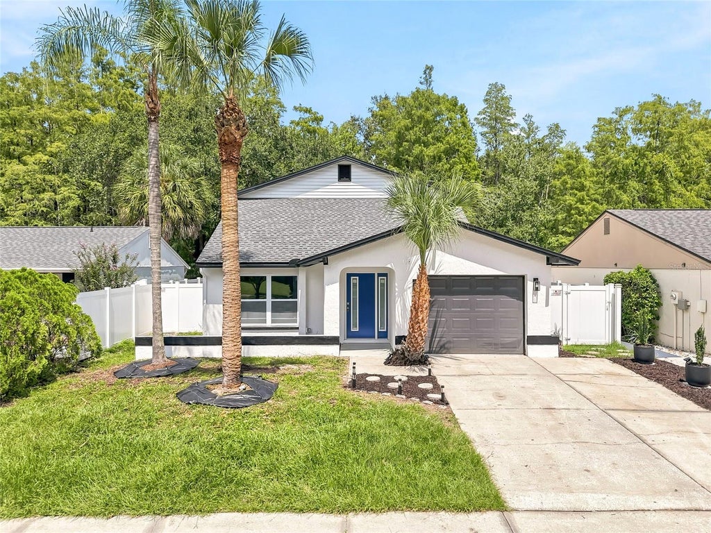 Photo of 15924 Winding Dr, Tampa, FL 33624 (MLS # TB8542200)