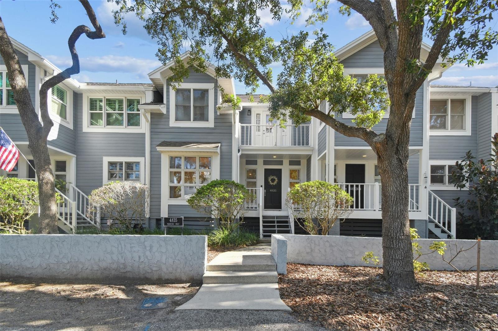 A rare opportunity in South Tampa—this beautifully updated Key West-style townhome is tucked away on a quiet, tree-lined street in a private enclave of just seven residences. With over 1,800 square feet of bright, open living space, this 3-bedroom, 2.5-bath home lives like a single-family residence and offers the ideal blend of charm and comfort in a prime location.
Positioned high and dry and untouched by recent storms, the home includes an assumable flood insurance policy for added peace of mind. Pride of ownership shines through—thoughtfully maintained and stylishly updated with fresh interior and exterior paint (2025), luxury vinyl plank flooring, updated baseboards, and low-maintenance turf. Major improvements like newer appliances, a newer roof (2019), added insulation (2025), and a brand-new A/C system (2024) boost efficiency and offer lasting value.
As you enter, you're welcomed by an inviting foyer and a refined dining area adorned with floor-to-ceiling windows—ideal for intimate dinners or hosting friends and family. At the heart of the home, the kitchen has been tastefully updated and connects effortlessly to both dining and living areas, creating a warm and functional space for daily life. The oversized open living room is filled with natural light and anchored by a cozy wood-burning fireplace. Sliding glass doors lead to your private, fully fenced courtyard complete with a deck and turfed green space—perfect for relaxing morning coffee, pets, or outdoor entertaining.
The tiered staircase leads you to a spacious primary suite with vaulted ceilings, a remodeled modern ensuite bath, a private balcony retreat, and a large walk-in closet. Two additional generously sized bedrooms share an updated full bath, and a conveniently located laundry area completes the second floor.
The home includes a spacious attic and outdoor shed—great for additional storage. A one-car detached garage, along with three additional dedicated parking spaces at both the front and back of the unit, makes everyday living easy and convenient.
Enjoy a prime location just North of Gandy- minutes from waterfront dining favorites like Salt Shack and Hula Bay, with quick access to the Westshore Marina District, Hyde Park, Downtown Tampa, International Plaza, Tampa International Airport, and Downtown St. Pete. Opportunities in this quiet, tucked-away community don’t come around often. Here’s your chance to enjoy the lifestyle, privacy, and value this South Tampa gem offers—schedule your private tour today!