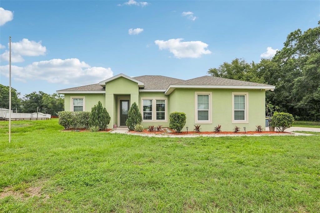 Photo of 9876 Pangola Loop, Land O Lakes, FL 34639 (MLS # TB8515486)