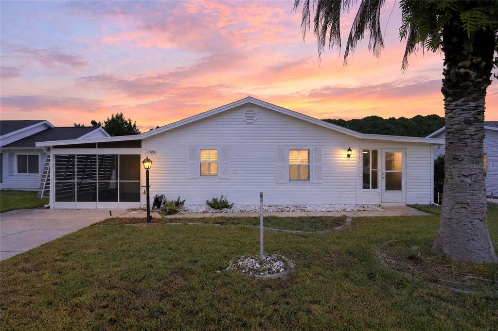 Photo of 1124 Del Toro Drive, Lady Lake, FL 32159 (MLS # OM733612)