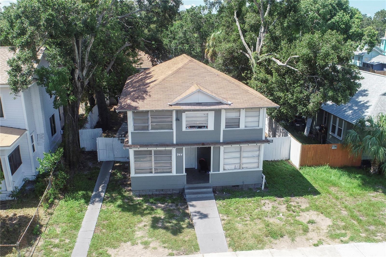 NO FLOOD damage or hurricane claims made by current Owners - property is in X Flood Zone. Very Rare 5-unit Multi-Family Investment Property only minutes from Downtown St. Pete and Tropicana Field. New Roofs on all buildings in 2022. Foundation stabilization for all 3 buildings with Lifetime Warranty. All units are separately metered for electric and water. Property has had many recent updates, including but not limited to waterproof flooring in all units, updates to plumbing and electrical, interior and exterior paint, cabinets, A/C units and much more, including current renovations underway. Property is within blocks of Midtown Academy, local library and area Community Center!
This property offers many future use possibilities in a developing area of St. Petersburg, as it is zoned for up to 9 units by both the county and the state. There is a common utility room that used to have an on-site W/D which would add additional revenue (and tenant interest) from a coin-op W/D. Sec-8 inspections have previously passed on all units and Sec-8 rates provide a very strong CAP Rate for this Investment Property... with tons of potential utilizing future development!
Do not let this opportunity get away. Please DO NOT DISTURB TENANTS....Showing by appointment only please TEXT listing Agent with all questions and to set up showings. No sign on property.