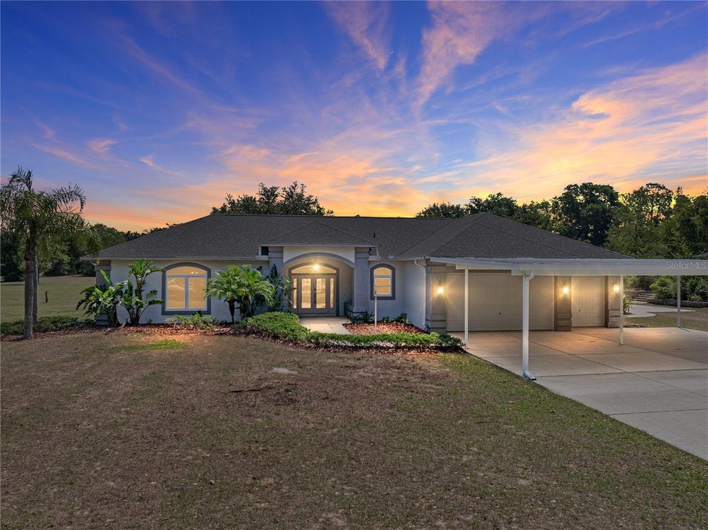 Photo of 9850 Nelson Road, Dade City, FL 33525 (MLS # TB8379329)