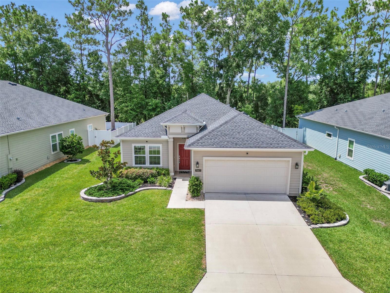 Elegant home in Premier 55+ Community – Minutes from World Equestrian Center. This beautifully upgraded 3-bedroom plus den, 2-bath home combines style, comfort, and functionality in one stunning package. Located in a vibrant 55+ community, this residence offers a luxurious yet low-maintenance lifestyle just 15 minutes from the World Equestrian Center and close to top dining, shopping, and Sholom Park. Step inside and be wowed by: Gorgeous 42" white cabinets with crown molding, Quartz countertops, and a large island – perfect for entertaining. Wood-look tile flooring throughout all living areas for warmth and elegance.Spacious primary suite with a huge walk-in closet, dual vanities, and a large walk-in shower with a custom-built-in bench. Modern upgrades, including paint, designer window coverings, glass backsplash, lights, and epoxy-coated garage & lanai floors. Enjoy Florida living with: A rolling glass wall opening to the covered, screened lanai – your private retreat, custom stacked stone flower beds, and gutters. Community amenities include: Covered Pavilion & Community Pool, Pickleball, Shuffleboard, and Bocce. Plenty of opportunities for recreation and socializing. Prime Location: Close to restaurants, shopping, and entertainment. Perfect for those seeking a blend of peaceful living and easy access to local attractions.