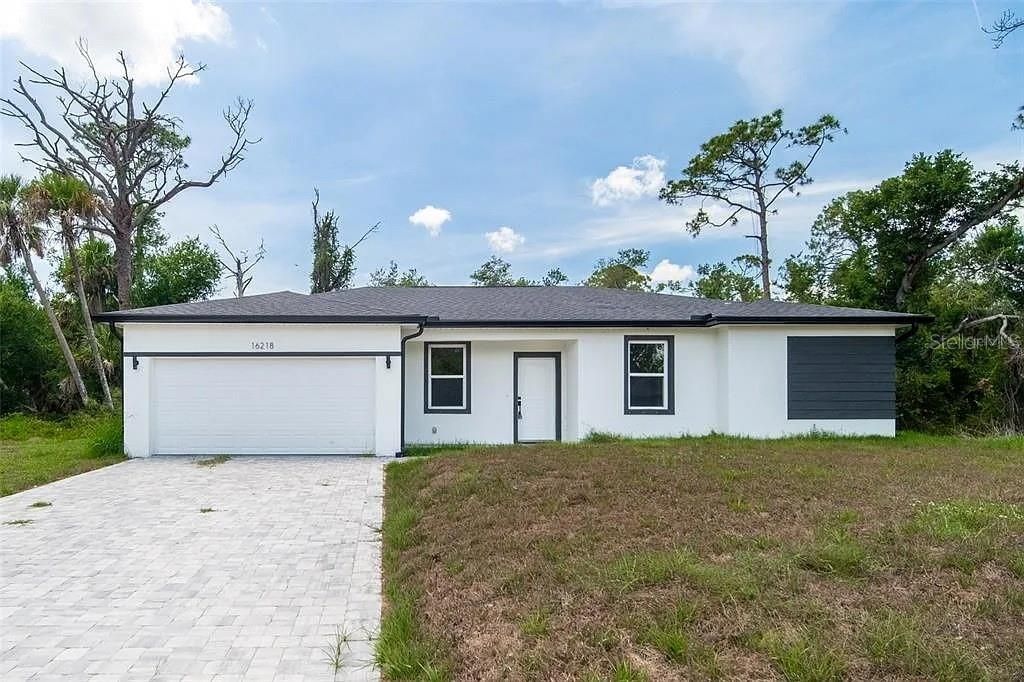 Photo of 16218 Chamberlain Boulevard, Port Charlotte, FL 33954 (MLS # C7512477)