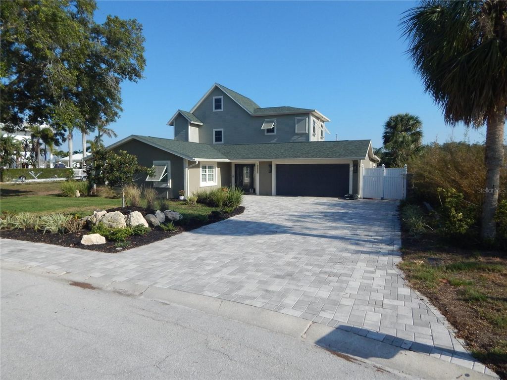 Photo of 8025 Island Drive, Port Richey, FL 34668 (MLS # TB8385904)
