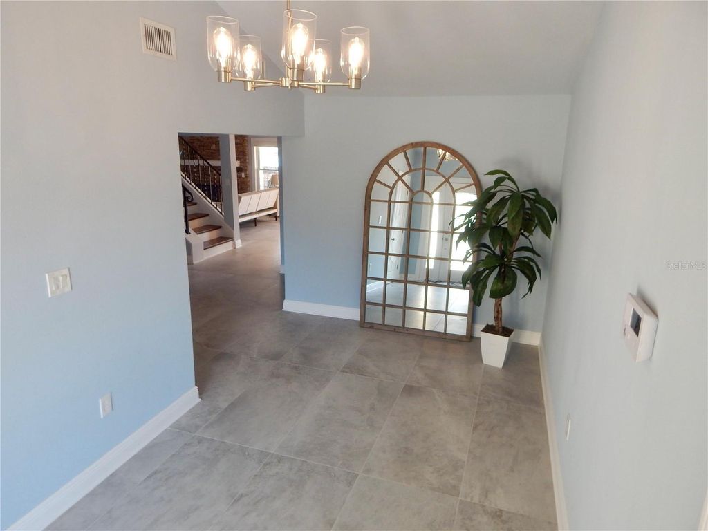 Photo of 8025 Island Drive, Port Richey, FL 34668 (MLS # TB8385904)