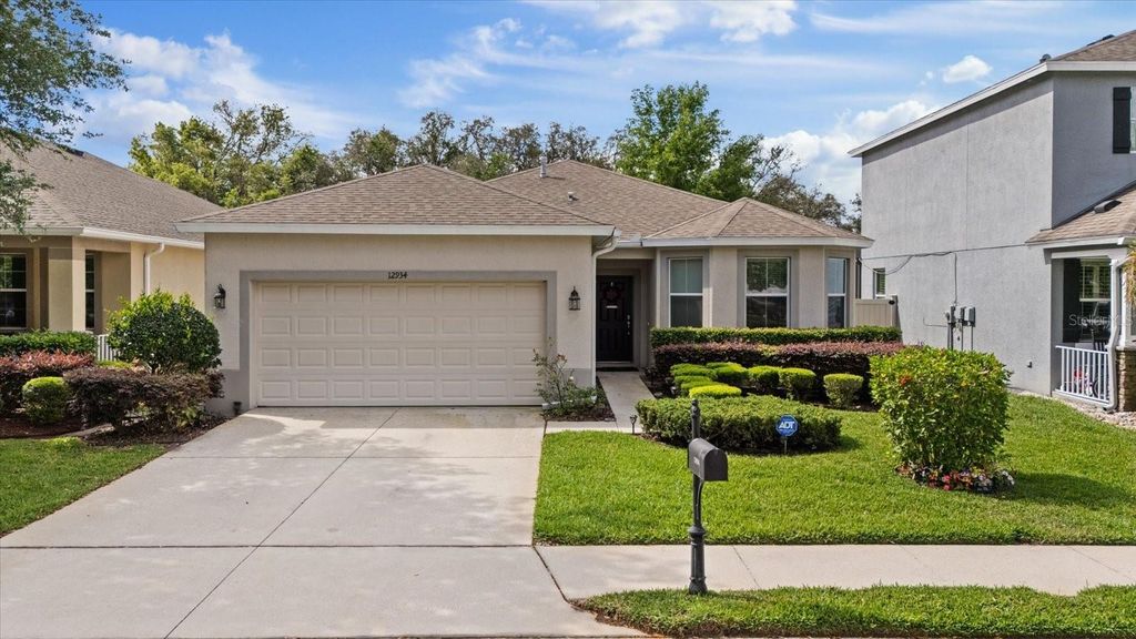 Photo of 12934 Tikal Way, Trinity, FL 34655 (MLS # TB8364962)