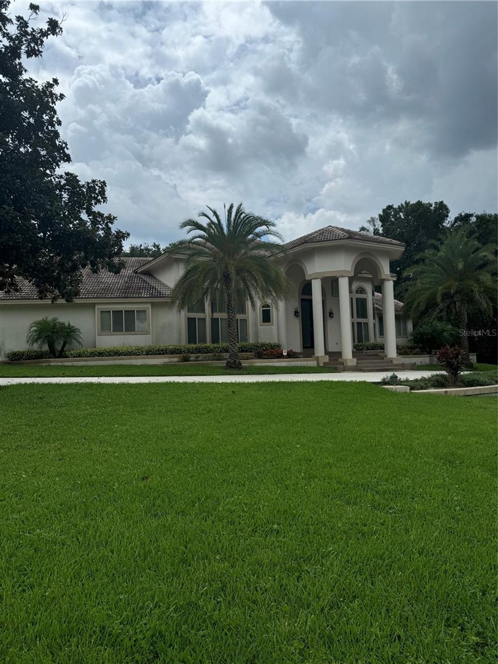 Photo of 1040 Sweetwater Club Boulevard, Longwood, FL 32779 (MLS # S5153603)
