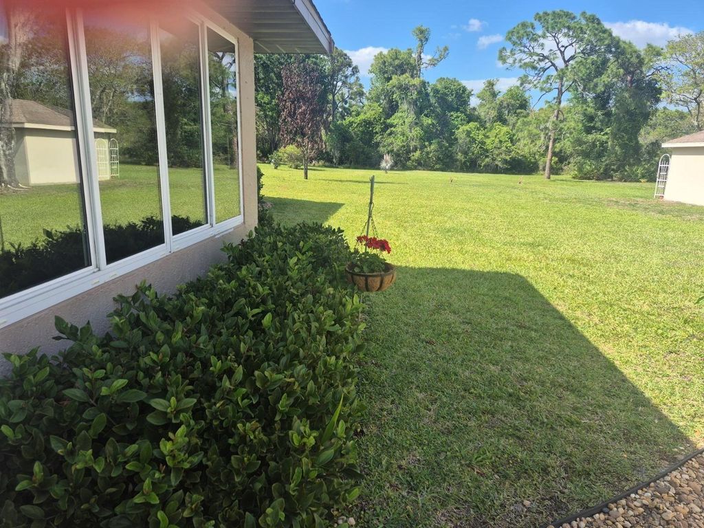 Photo of 51 Quail Roost Road, Lake Placid, FL 33852 (MLS # O6399799)