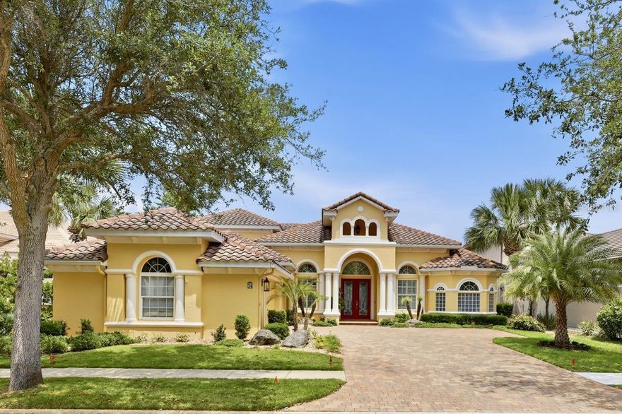 Welcome to this exceptional waterfront estate located in the desirable gated community of Grand Haven. Offering 3,006 square feet of living space, this fully updated property features 4 bedrooms plus a dedicated office, 3.5 bathrooms, and breathtaking views of the Intracoastal Waterway throughout. Light and bright, the home is designed to take full advantage of the natural light and waterfront setting from the moment you walk in. As you arrive, the paver driveway and beautifully maintained landscaping create a welcoming first impression. Step through the front entry into the main living area where coffered and tray ceilings add architectural detail, while a fireplace anchors the space. Large sliders open to the screened lanai, bringing the outdoors in and perfectly framing the water views. The layout offers an open flow while still maintaining defined spaces for everyday living and entertaining, including a formal dining room and a breakfast nook overlooking the water. Just off the main living area is a dedicated office, creating a quiet and functional workspace. The fully updated kitchen features new cabinetry, quartz countertops, and stainless steel appliances, offering a clean and timeless look while remaining open to the living spaces and water views. The primary suite is positioned to overlook the water and features French doors leading directly to the lanai. Inside, you’ll find two closets and an en-suite bathroom with separate vanities, a soaking tub, and a walk-in shower. Upstairs, the fourth bedroom includes its own private balcony overlooking the water along with an attached half bath, making it a great space for guests or additional living. The laundry room is a true separate space complete with built-in counter space and a sink for added convenience. The screened lanai extends the living space outdoors and features a saltwater pool and spa, along with a Summer Kitchen equipped with a grill and sink, creating the perfect setup for entertaining. Beyond the lanai, a firepit area overlooks the water, while a paver pathway leads to the covered dock and Intracoastal beyond. Recent updates include a resurfaced pool, new pool heater installed one year ago, fresh interior and exterior paint, new pavers, new carpet installed last year, and a boat lift approximately three years old. Additional features include a whole-house generator, irrigation system, and an oversized garage with a marbleized floor finish. This home offers the best of waterfront living within a gated community close to shopping, dining, golf courses, and the beach. Seller financing available up to 50%.