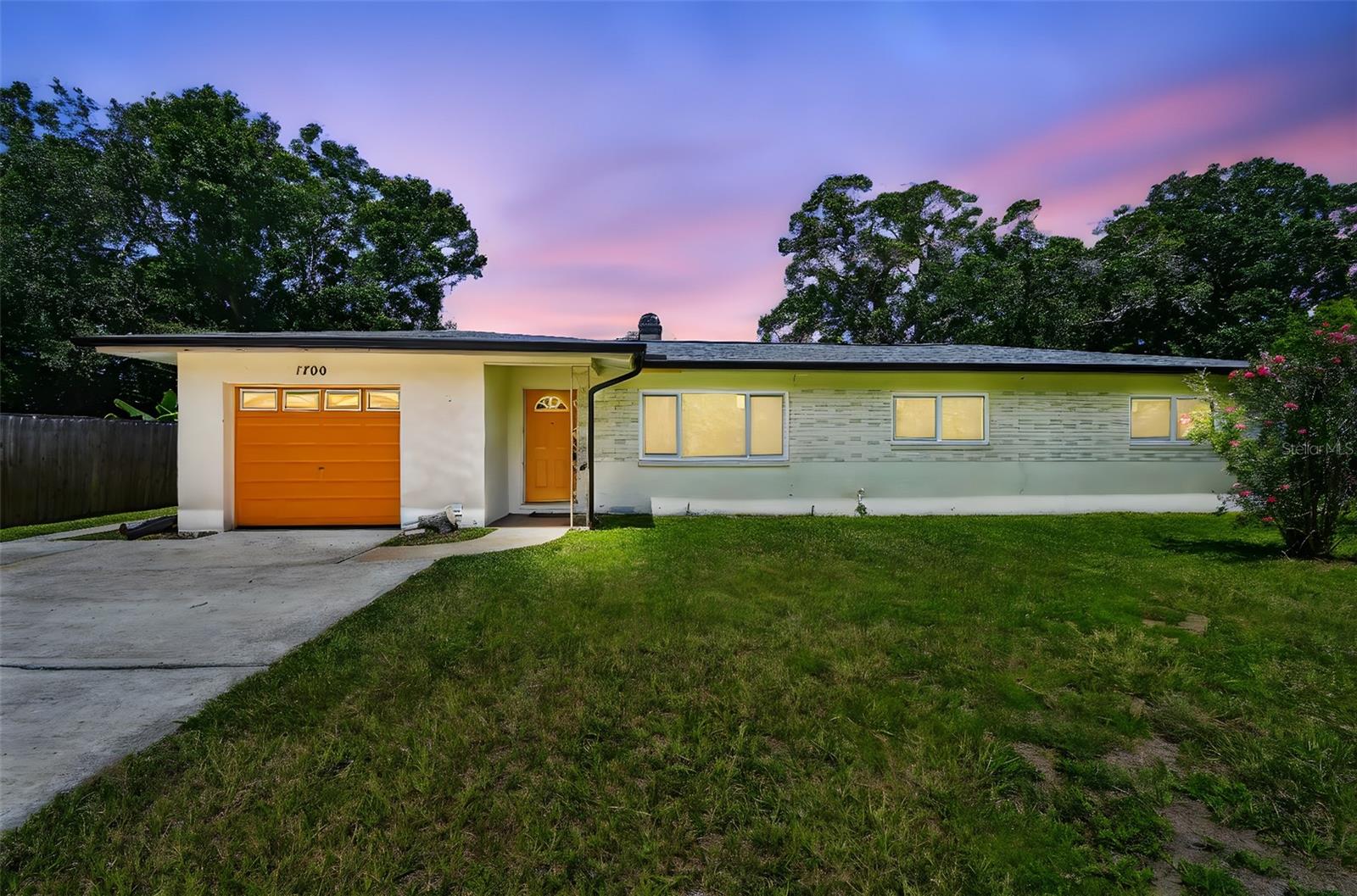 Tucked at the end of a quiet cul-de-sac, this Clearwater pool home is the ultimate Florida retreat. Nestled on an oversized 0.31-acre lot, this spacious 3-bedroom, 2-bathroom home offers both charm and functionality. Step inside to find vinyl plank flooring throughout the living area, where a cozy wraparound brick wood-burning fireplace serves as the heart of the home. Just off the kitchen, a bonus room with cedar plank ceiling details adds character and versatility—perfect for a home office, playroom, or reading nook. The primary suite offers privacy and comfort with an ensuite bathroom and a stand-up shower. But the real showstopper is the backyard. Slide open the glass doors and step into your very own oasis—featuring a newly added screened-in lanai and sparkling in-ground pool, ideal for sunny days and weekend get-togethers. The expansive fenced-in yard has endless possibilities: room for pets to roam, a garden, a playset, or even a dreamy firepit hangout. A large shed in the backyard provides plenty of additional storage or the perfect spot to build out your workshop. Conveniently located just a short walk to Ponce De Leon Elementary and only minutes from popular parks like Eagle Lake, Highland Rec Complex, Largo Central Park, and more. Whether you’re looking for outdoor adventure, arts and entertainment, or a day at the beach, you’re just 10 minutes from Clearwater Beach and close to golf courses, shopping, and dining hotspots. This is more than just a house—it’s a lifestyle.