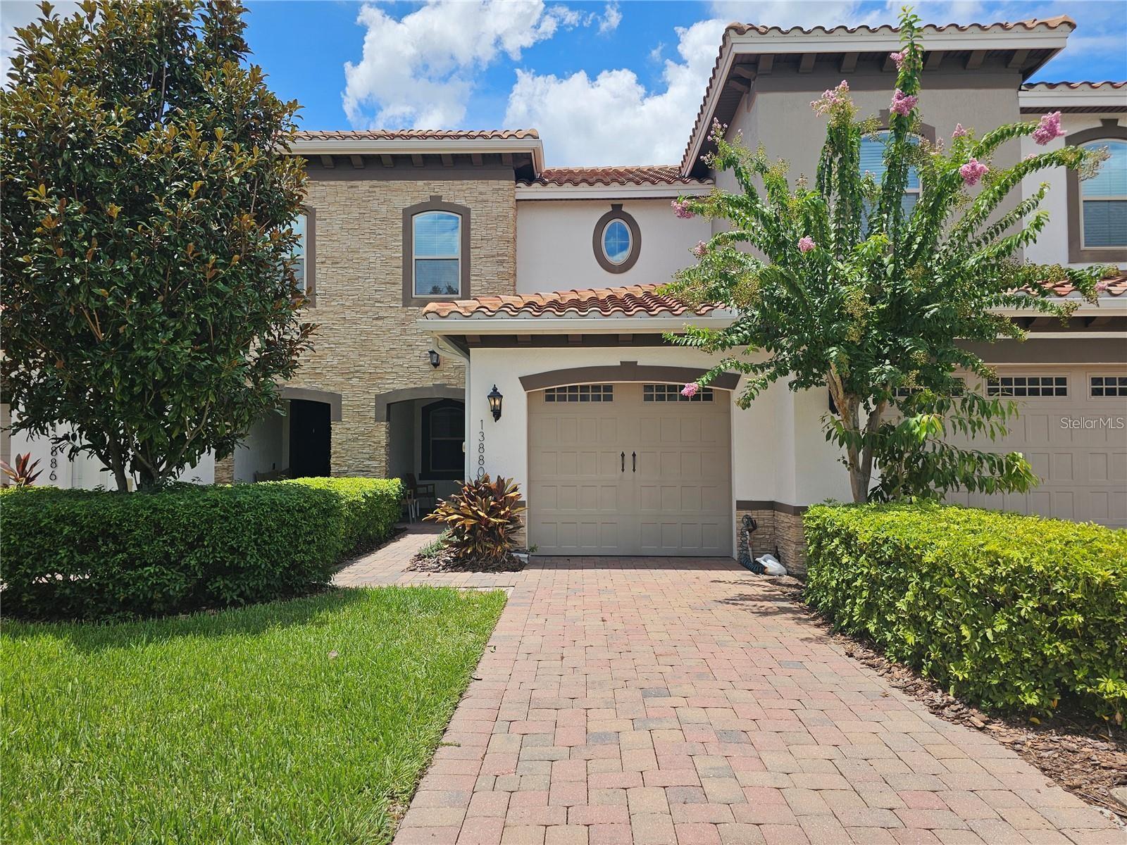 Stunning 2 bedroom 2.5 bathroom townhome in the gated community of Eagle Creek! Open floor plan on the first floor with a modern kitchen and stainless steel appliances. Great for entertaining guests! Eagle Creek has round-the-clock security and is located around a championship golf course with plenty of amenities. The home is located near Lake Nona's medical facilities and Orlando International Airport. The kitchen sink is equipped with Frizzlife Under Sink Water Filtration. The garage comes with a 220V outlet connected at 50 amps, which is perfect for all EV charging needs.