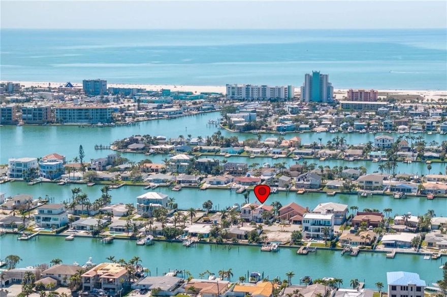 One or more photo(s) has been virtually staged. This luxurious Mediterranean-custom waterfront residence with over 3,800 sqft of living space offers a unique opportunity to complete a personally curated interior within a structurally sound, architecturally rich coastal home. Perfectly positioned, deep water no Bridges sailboat friendly minutes to the Gulf of Mexico. A premier waterfront setting, the home blends timeless Mediterranean character with exceptional scale and an unmistakable sense of coastal elegance. A dramatic entry with soaring 28-foot ceilings creates a grand arrival and sets the tone for light and openness found throughout the home. Conceptual 3D rendering videos attached, to illustrate one potential design direction and showcase the home’s remarkable possibilities.

The home reflects an effective age of 2002 and is noted in county records as being in excellent condition, providing confidence in the integrity of the structure while allowing full creative freedom to complete the interior. Expansive window openings, high ceilings, and an open-concept layout are intentionally created to capture beautiful water views and abundant natural light throughout the living spaces.

Brand new custom PGT impact-resistant hurricane windows and doors have been installed throughout, offering durability, energy efficiency, and peace of mind. Custom Framing throughout , Plumbing rough in, 2ed floor HVAC, electrical, all brand new pilings and wrapped, 1 of the 2 compressors already elevated, new pool pump, 2023 roof, newer doc decking with sink and fillet station . The interior remains a refined blank canvas, ready for walls, ceilings, flooring, cabinetry, fixtures, and finishes—supporting a sophisticated, high-end buildout across the residence allowing the home to be finished in alignment with your lifestyle and vision.

The primary suite is positioned to become a serene private retreat with peaceful water views, while additional bedrooms are generously proportioned and adaptable for guest suites, home offices, or wellness spaces. Set along a wide, navigable waterway there is seamless access to open waters. The property is ideal for boating and effortless coastal living. New pilings have been installed and wrapped, enhancing the long-term value and enjoyment of the waterfront experience.

An offering that unites architectural elegance and creative freedom. This is an exceptional opportunity to create a one-of-a-kind Mediterranean luxury coastal residence in a highly desirable waterfront community.

FEMA actual cash value appraisal completed 1.3 million structure alone after depreciation. 49% allowance for repairs $680,000, approved by the county with active permits. (New Construction custom pricing ground up $700 Pr Sf entry level, plus lot cost 1.250M ) estimate only. Window and door, waterproof inspection complete. 3rd party, June 2025l Appraisal available. Flood insurance assumable.