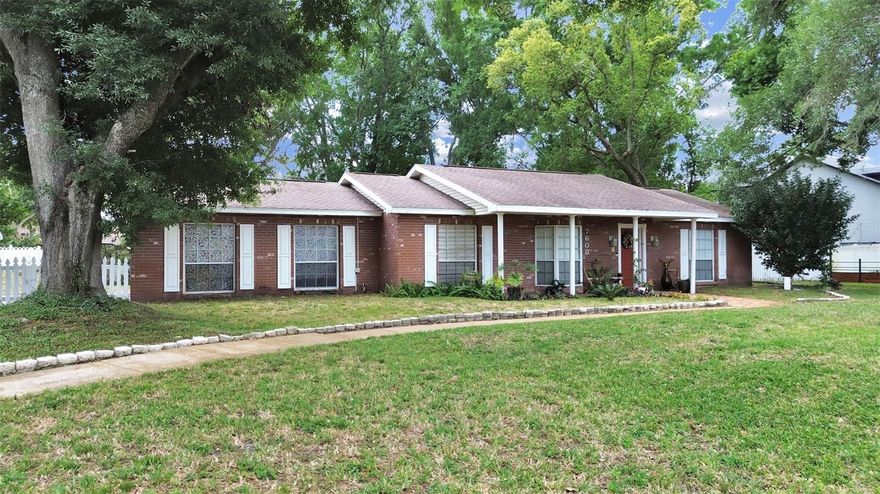 Lovely 4 bedroom/2.5 bath pool home in Pat Acres, home sits on large 1/2 acre lot.  Remodeled kitchen and all new baths, kitchen opens to family room and breakfast nook with bay window overlooking large inground screen enclosed pool area.  Ceramic tile in baths, laminate flooring in living areas and 2 bedrooms, carpet in 2 bedrooms.  Covered front entry opens to nice foyer with hall closet.  Concrete block shed in rear that's great for storage.  Inviting brick patio under the trees is a great place to enjoy the spacious side and rear yards.  Plenty of room to park your boat or rv here too.  There is no HOA or deed restrictions, but an active civic association.