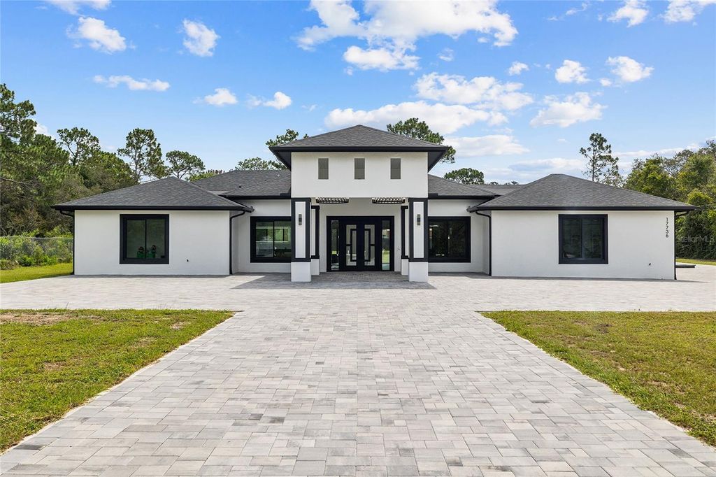 Photo of 17736 Overstreet Lane, Spring Hill, FL 34610 (MLS # TB8416221)