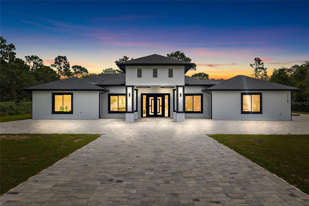 Photo of 17736 Overstreet Lane, Spring Hill, FL 34610 (MLS # TB8416221)