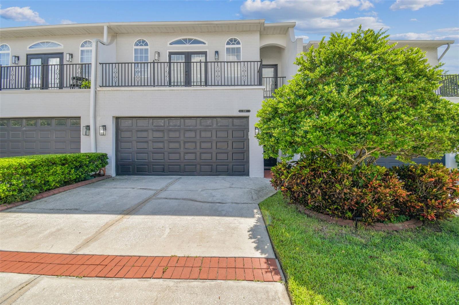 This Baylife Luxury Townhome in New Suburb Beautiful truly feels like a single-family home. With an expansive 2,666sqft floorplan, it offers a sophisticated blend of modern living and timeless charm in one of South Tampa’s most iconic neighborhoods. Thoughtfully designed with both comfort and style in mind. Upon entry, a welcoming foyer with a powder bath opens to a dramatic staircase and expansive open-concept layout, ideal for both everyday living and entertaining. The spacious living and dining areas flow seamlessly into the light and bright kitchen, where you’ll find quartz countertops, an island with cooktop, a sleek hood-vent system, stainless steel appliances, tile backsplash, and a hidden under-stair pantry tucked behind a custom barn door. The breakfast bar offers ample seating for your guests. French doors open to a private patio downstairs and a charming balcony upstairs, effortlessly connecting indoor and outdoor living. Upstairs, the luxurious primary suite features a generous sitting area, dual closets, and a spa-style ensuite bath complete with a jacuzzi tub, walk-in shower, and a private cedar sauna - your personal retreat. Two additional bedrooms and full bath complete the second level. Additional highlights include crown molding, a decorative TV feature wall, a private back patio, laundry room including washer and dryer, and a two-car garage with epoxy flooring. The home is part of an intimate community of just eight residences that share access to a quiet and serene outdoor space with pool. No storm damage from Hurricane Helene or Milton. This residence delivers an exceptional living experience just minutes from Hyde Park Village, SOHO, Bayshore Blvd, Downtown Tampa, Davis Islands, Water Street and Tampa International Airport. NEW ROOF installed 2025! A rare opportunity to own a home in one of South Tampa’s most desirable neighborhoods - schedule your private showing today.