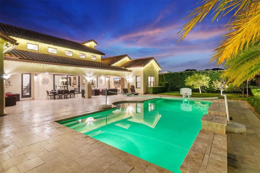 STUNNING CUSTOM ESTATE in the EXCLUSIVE GATED community of Sawyer Sound - a private enclave of 20 luxury homes, ideally located across the street from Windermere Prep, and close to excellent dining and premiere entertainment. Built under the meticulous supervision of its owners, one of whom is an accomplished interior designer, this home showcases curated exceptional quality finishes and craftsmanship, and attention to detail. With natural MARBLE FLOORS, soaring ceilings adorned with real WOOD BEAMS, solid-core interior doors, designer lighting, thick crown moulding, beautiful CUSTOM window treatments and appealing color schemes, you'll find LUXURY in every detail. The chef's kitchen is a masterpiece with rare natural stone CRISTALLO QUARTZITE counters featuring under lighting for a warm dramatic glow, custom wood cabinets, a COPPER farmhouse sink, imported fixtures, and all THERMADOR appliances - including an 8 burner NATURAL GAS range and a built in STEAM OVEN that functions as microwave, convection oven, and air fryer. Gatherings in this home are show stoppers with STACKED SLIDING DOORS that disappear to create a seamless transition to the lanai, pool area with gorgeous NATURAL TRAVERTINE, REMOTE CONTROLLED RETRACTABLE SCREENS, NATURAL GAS FIREPLACE, SUMMER KITCHEN, SALT WATER HEATED POOL,  and a LUSHLY LANDSCAPED backyard oasis with a tiki hut - LIVE EVERY DAY LIKE A VACATION! Enjoy the comfort of TWO PRIMARY SUITES, each with spa style luxury bathrooms offering large showers, soaking tubs and custom walk-in closets. The main suite has a bedroom in close proximity that would be an ideal nursery, library or office. Two more bedrooms share a beautifully designed bathroom and each has a walk-in custom closet. Rooms are adorned with real wood PLANTATION SHUTTERS and/or DESIGNER MADE WINDOW TREATMENTS, including silk lined drapes with darkening fabric in the primary suite. Practical luxury continues with a huge laundry room with granite counters, custom cabinets, closet, sink and a folding area. The pantry doubles as a thick concrete reinforced “SAFE ROOM" equipped with a phone line and additional security and safety features. ENTIRE HOME NATURAL GAS GENERATOR ensures no interruption to your comfort. Every detail has been thoughtfully considered - from the water softener, energy efficient foam insulation, and double paned windows to the climate controlled three car garage with an EV car charger, epoxy floor, custom storage, large safe, and bike racks. SMART HOME technology allows you to control all systems from your phone - the thermostat, pool, lighting, interior and exterior cameras, and music. COME SEE WHAT SETS THIS MASTERPIECE APART FROM THE REST! EVERY SPACE IN THIS HOMe TELLS A STORY OF LUXURY, DESIGN AND COMFORT - CRAFTED FOR THOSE WHO EXPECT THE BEST! All measurements should be verified by buyer.