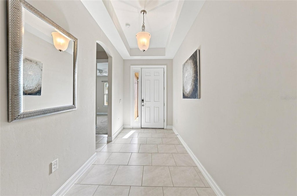 Photo of 719 Heather Lake Avenue, Cape Coral, FL 33993 (MLS # D6148530)
