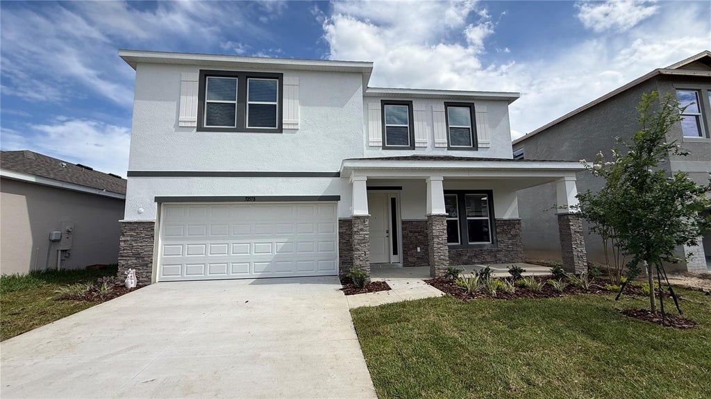 Photo of 32578 Rosepine Blvd, Wesley Chapel, FL 33543 (MLS # J1003425)