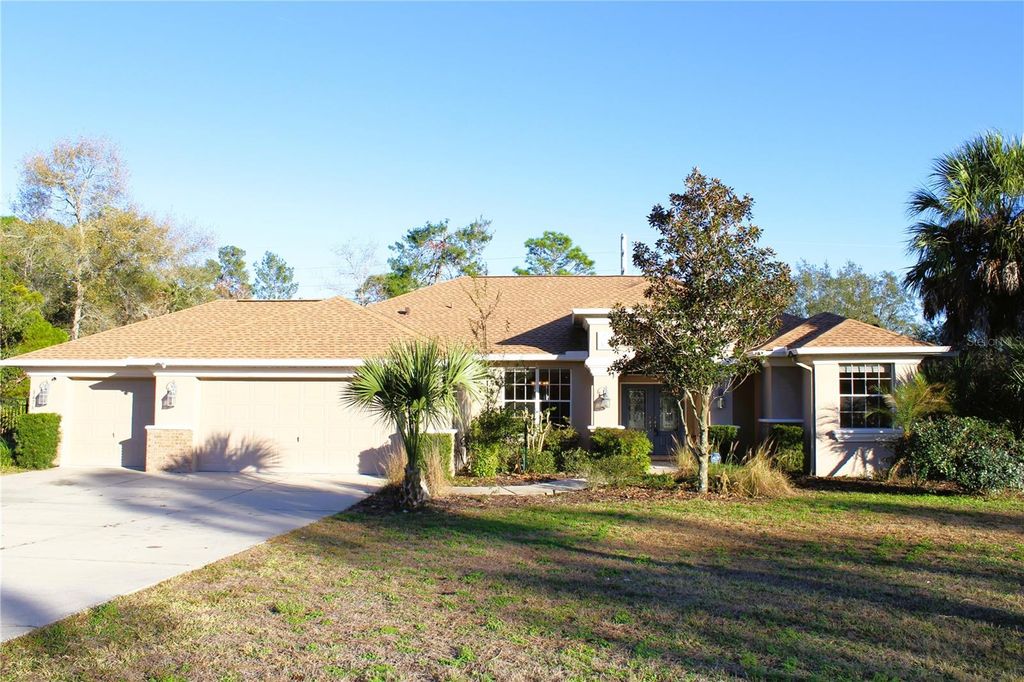 Photo of 8476 Madrid Road, Weeki Wachee, FL 34613 (MLS # O6369630)